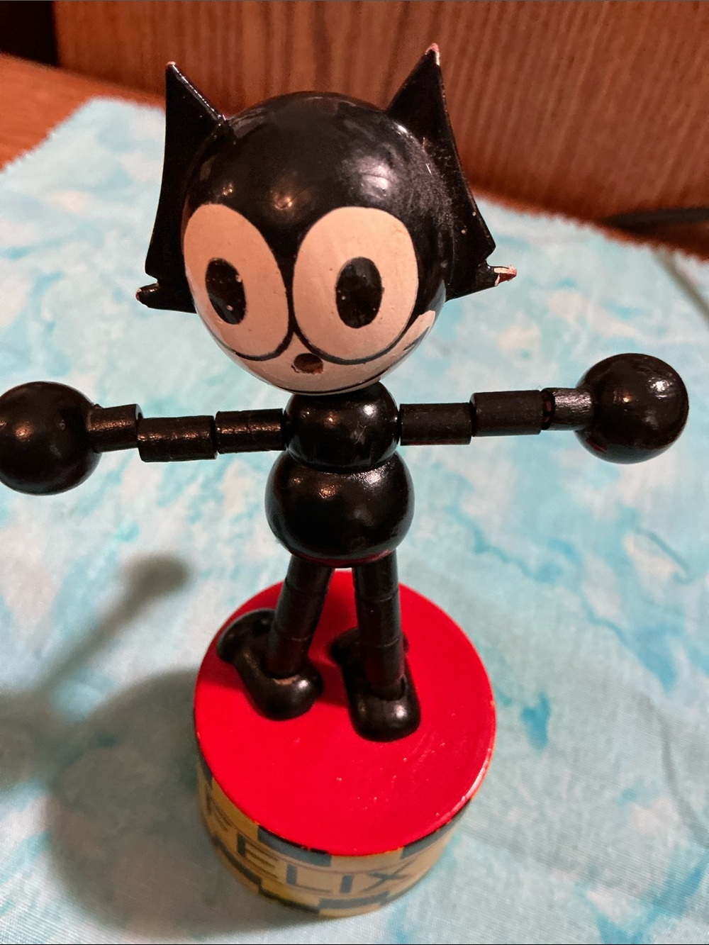 Vintage Felix the Cat wooden push puppet manufactured by FTCP,Inc